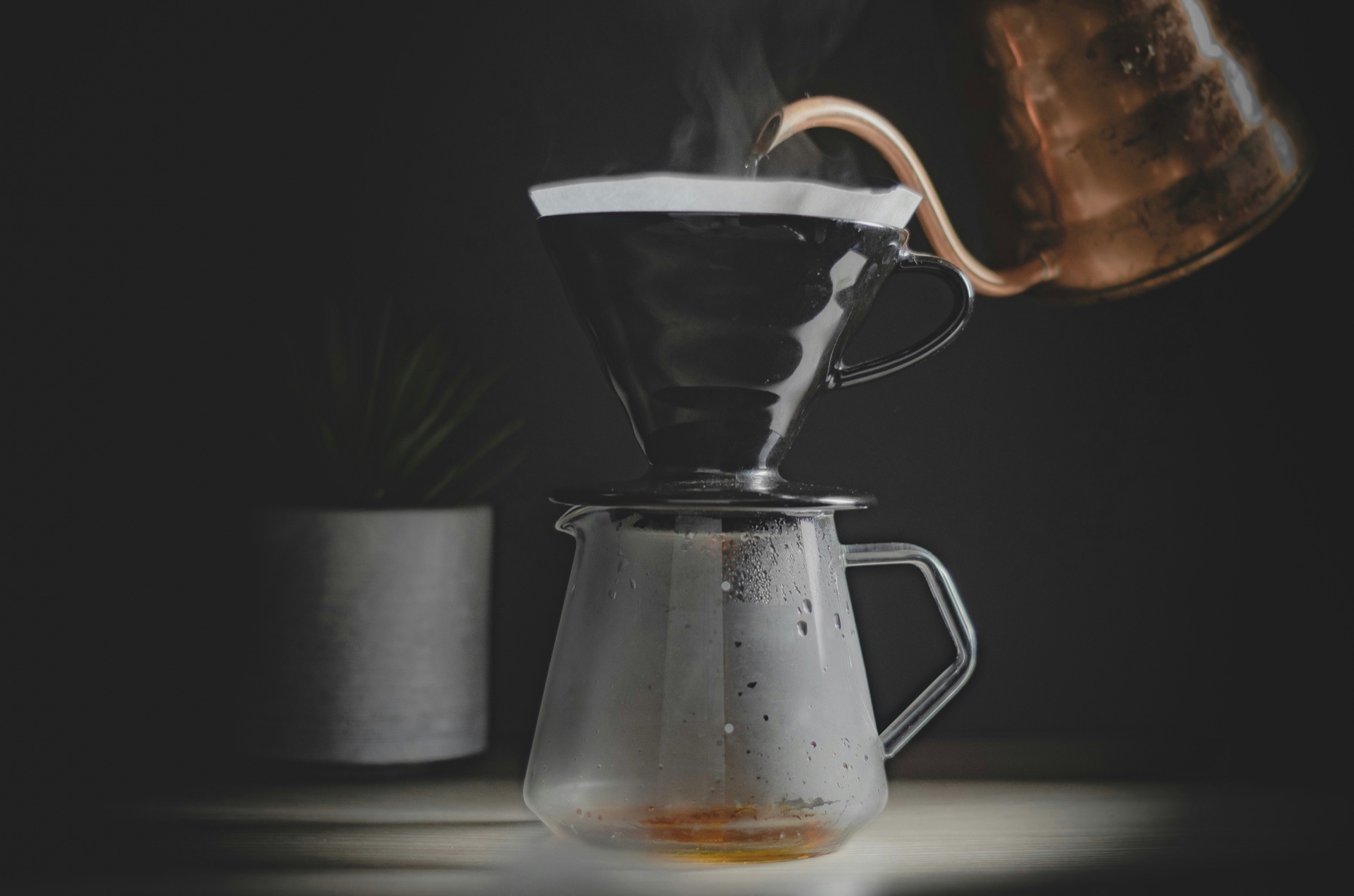 Specialty coffee brewing with steam rising