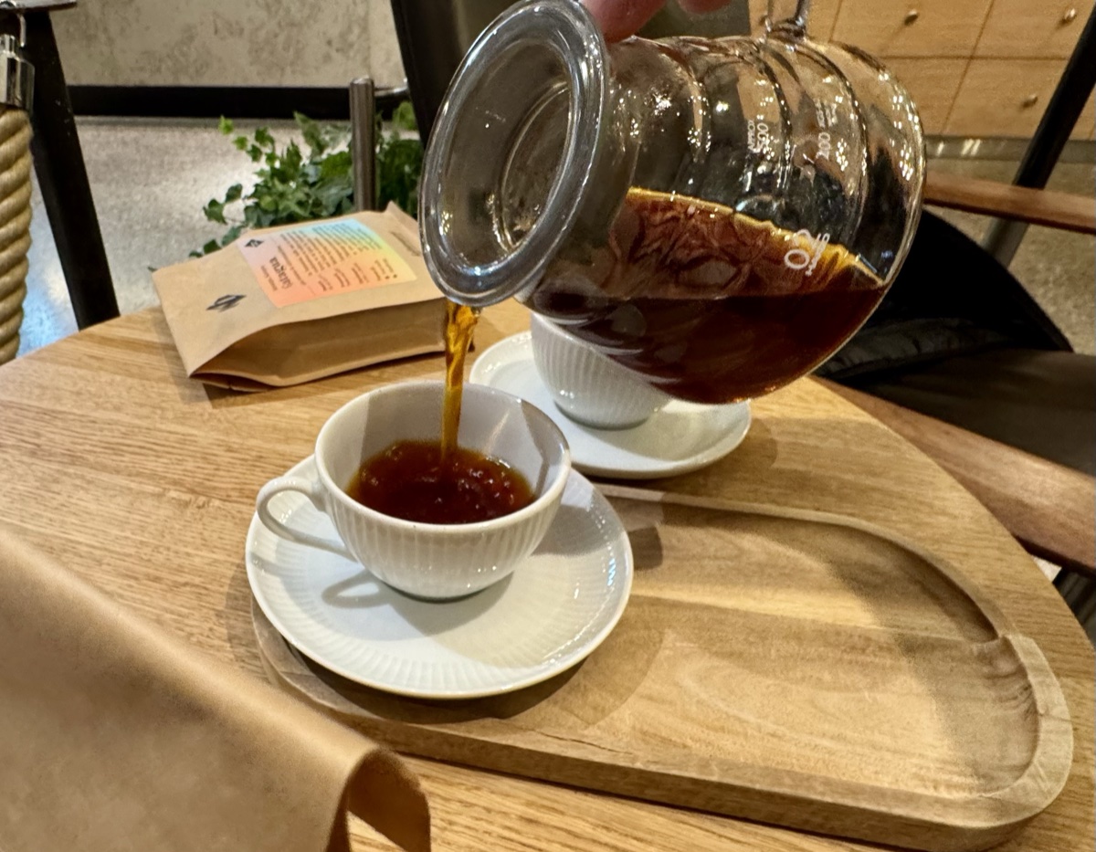 Coffee being poured at an Oslo specialty café