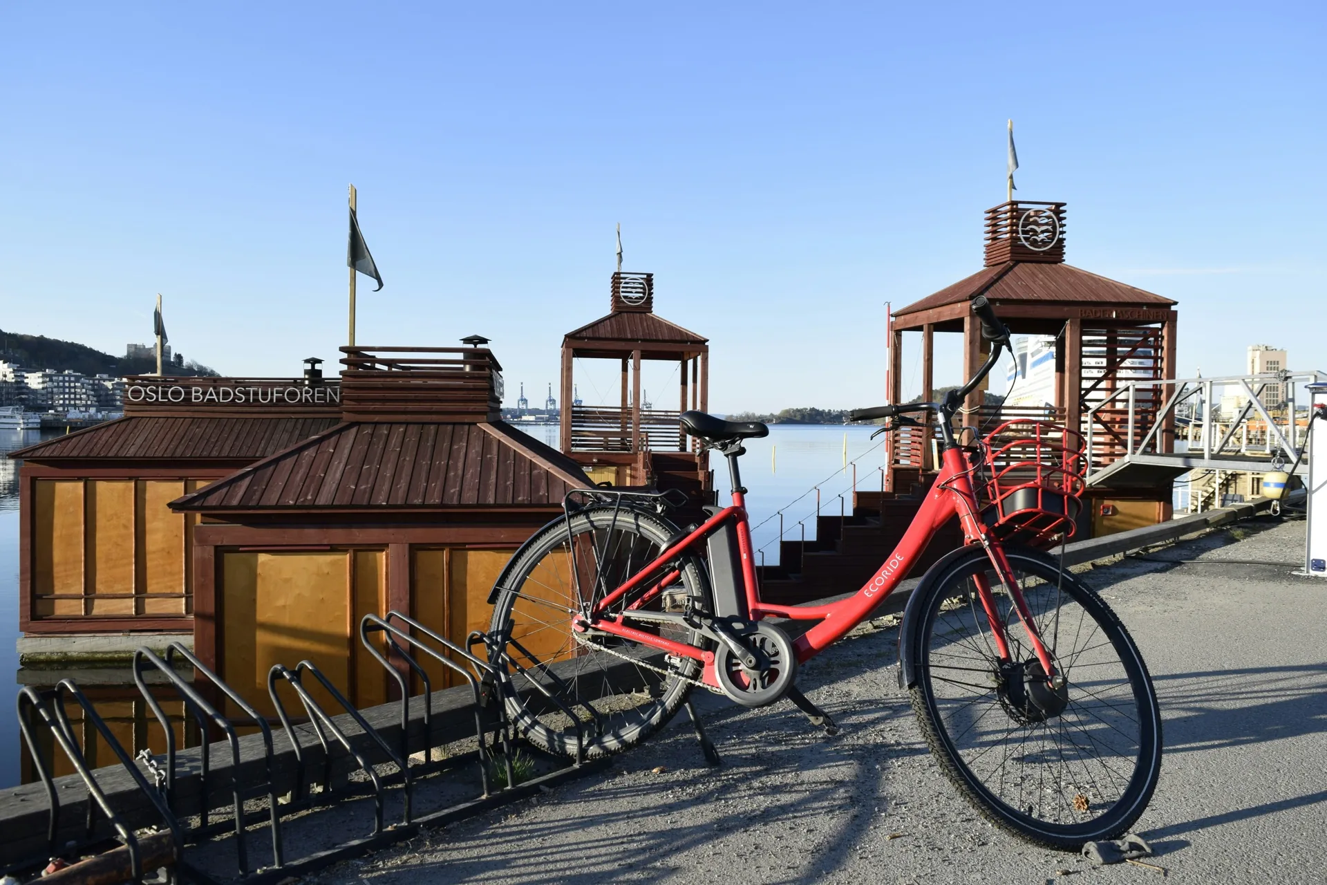 Red bike at the Oslo waterfront near Aker Brygge