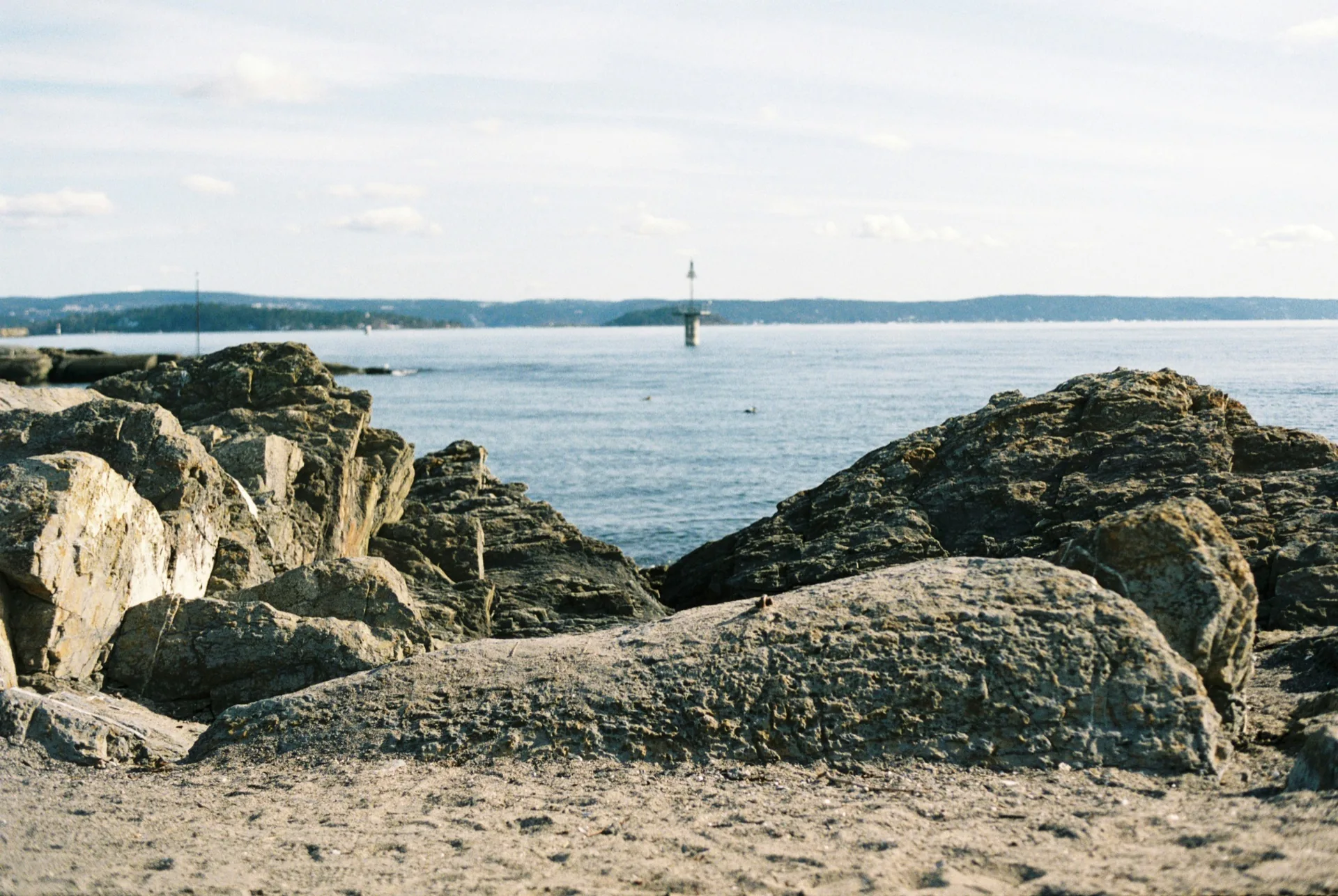 Rocky Bygdøy shoreline with the Oslofjord beyond